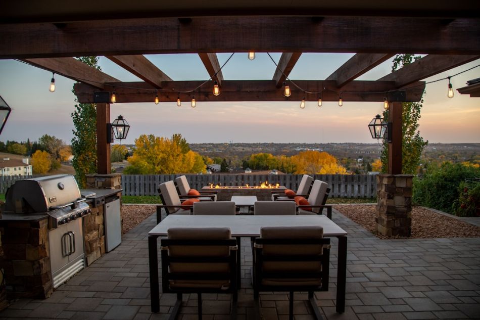 Pergola - brown wooden table and chairs